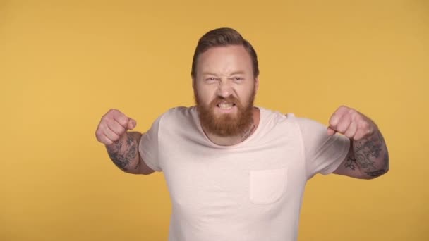Funny, agressive emotion of bearded man. Slowmotion. - Filmmaterial, Video