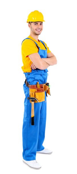 Male builder in yellow helmet isolated on white - Фото, зображення