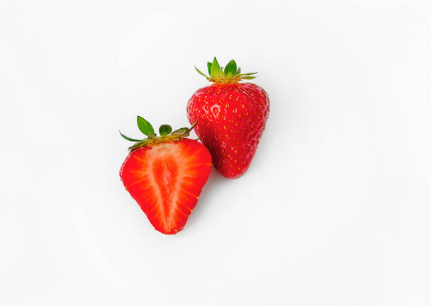 red strawberry, ripe juicy berry on a white background, close up - Φωτογραφία, εικόνα