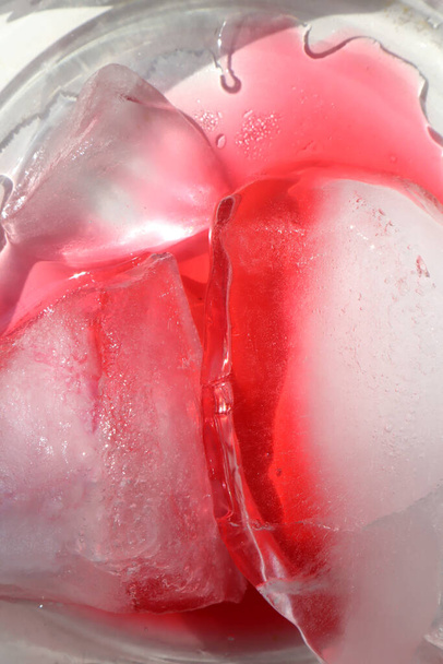 Raspberry juice with ice in a glass - Photo, Image