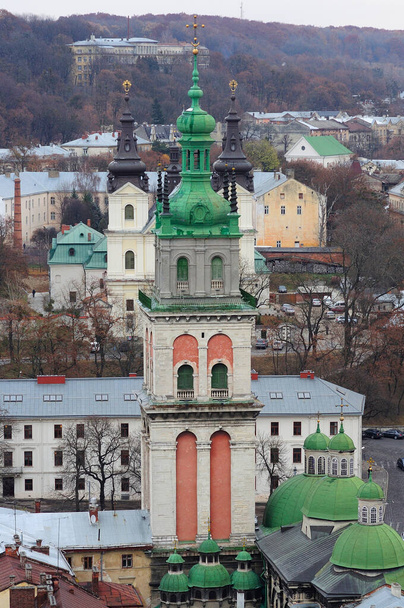 An old catholic churches at the historical centre of Lvov, top view. October 5, 2011. Lvov, Ukraine - 写真・画像