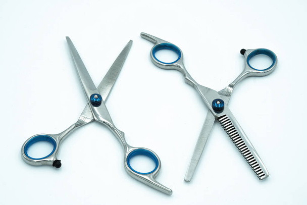A pair of hair scissors, work tool for hairdressers. Great shot for hairdressers and barbers - Photo, Image