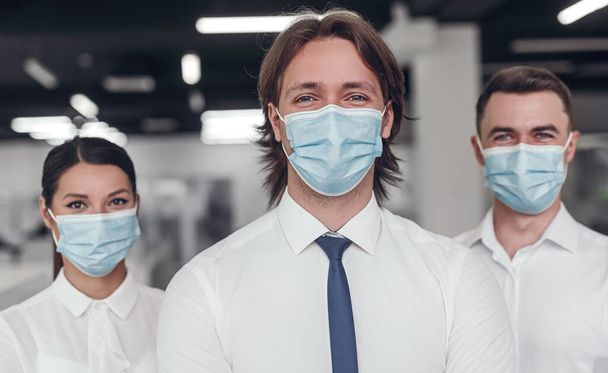 Business team in masks during epidemic - Fotoğraf, Görsel
