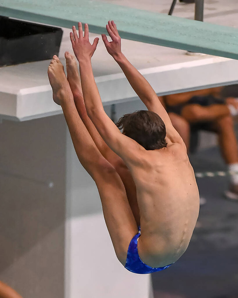 Boy Divers competing at a diving meet at a competition in South Texas - Foto, afbeelding