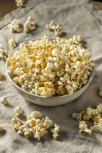 Homemade Salty Buttered Popcorn in a Bowl - Photo, image