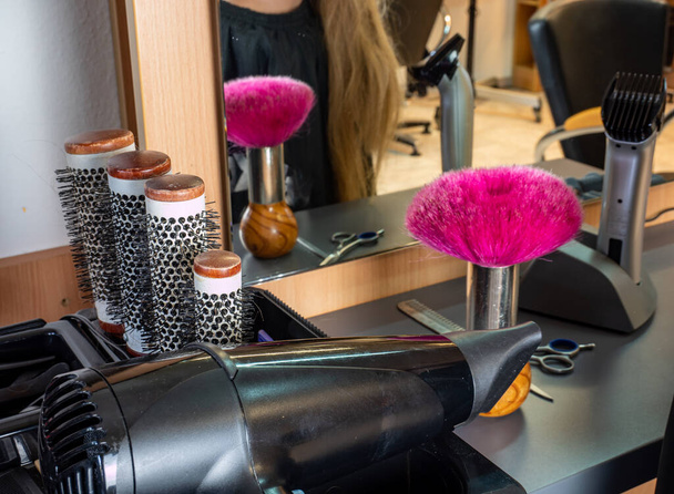 Hair salon Blonde woman cutting hair - Photo, Image