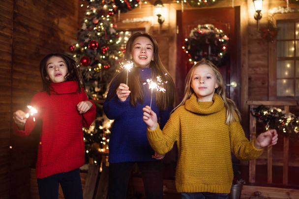 Kids with sparklers dancing - 写真・画像