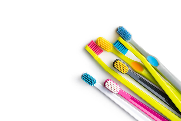 Various colorful toothbrushes isolated on white background. - Φωτογραφία, εικόνα