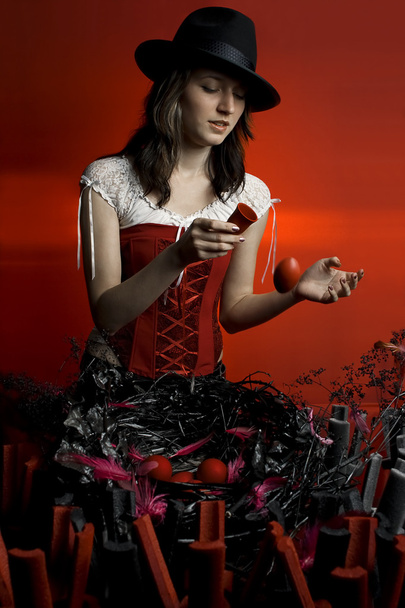 The young girl on a red background - Photo, Image