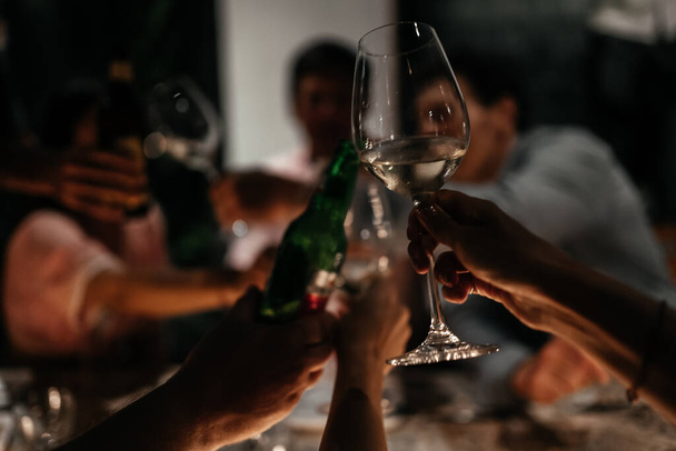 Blurred Wining with friends Drinking wine in a restaurant - Фото, зображення