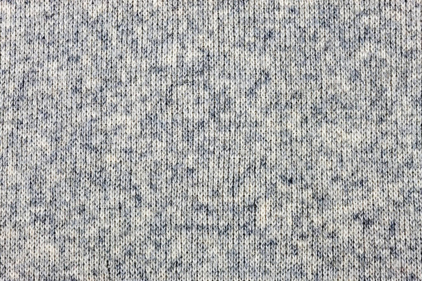 fil tricot fond, ce matériau est utilisé dans la fabrication de pulls, gilets et autres vêtements chauds - Photo, image