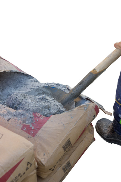 Worker takes one shovel of cement 2 - Photo, Image