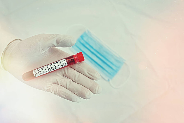 Conceptual hand writing showing Antiseptic. Business photo showcasing antimicrobial agents that delays or completely eliminate the microorganism Blood sample vial ready for medical diagnostic - Photo, Image
