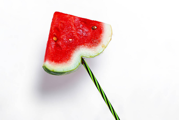 closeup of some pieces of refreshing watermelon on a white background. Heart of watermelon. - Fotó, kép