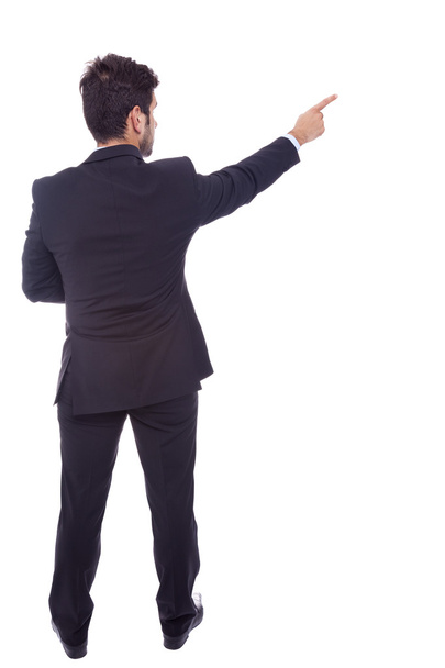 Business man pointing at something, isolated on white backgroun - Foto, Bild