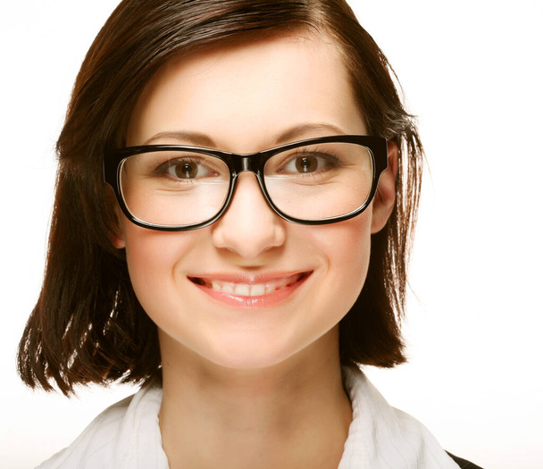 business woman portrait smiling wearing glasses over a white background - Foto, Imagen