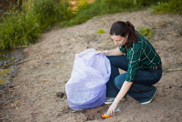 Taking care of our planet. Garbage collection and sorting. The problem of garbage in nature, - Valokuva, kuva