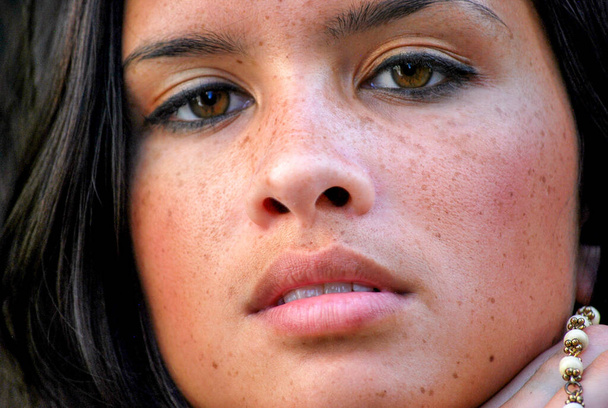 Sexy beautiful female brunette with freckles hazel eyes - Photo, Image
