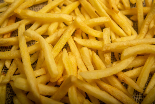 French fries scattered surface texture. Close up - Photo, Image