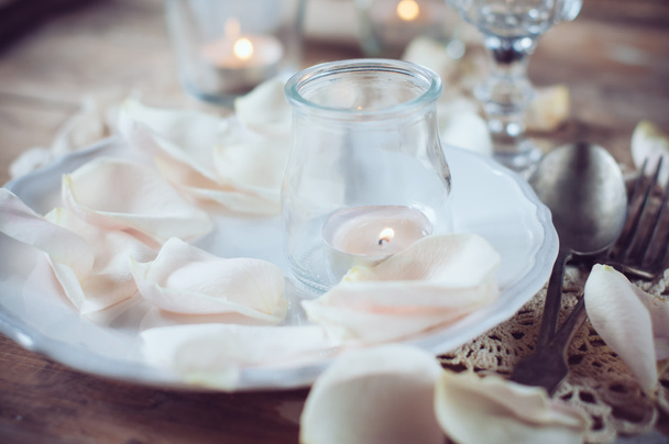 vintage table setting with rose petals - Photo, Image