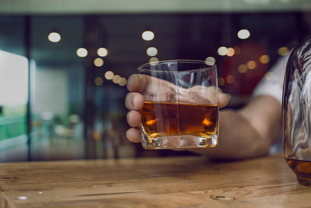 Bartender Serve Whiskey, on wood bar,  - 写真・画像