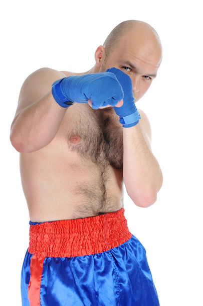 Adult fighter punches during training. - Fotoğraf, Görsel