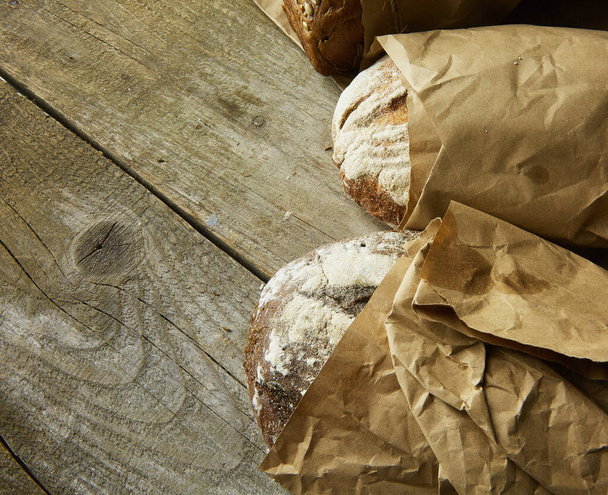 Composition of various breads, on wooden background - Foto, immagini