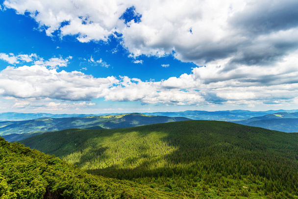 Mountain landscape with beautiful, low clouds. Carpathians. Ukraine. Nature Leisure Tourism Background - Photo, Image