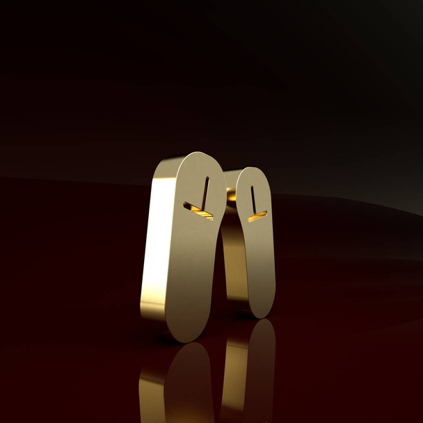Иконка золотой тапочки выделена на коричневом фоне. Вывеска с шлепанцами. Концепция минимализма. 3D-рендеринг
 - Фото, изображение