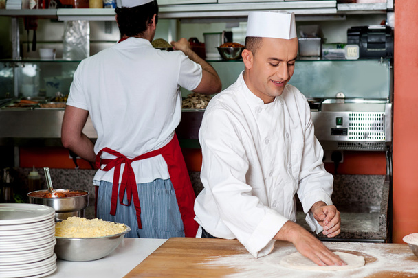 Chef preparing pizza base - Foto, Imagem