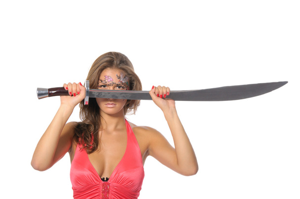 Young woman holds sword - Φωτογραφία, εικόνα