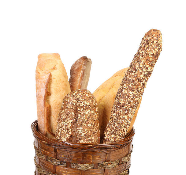 Fresh bread in baskets isolated on white - Foto, Imagem
