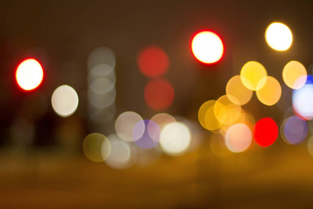 A closeup shot of colorful bokeh lights with a blurred background - Foto, Imagem