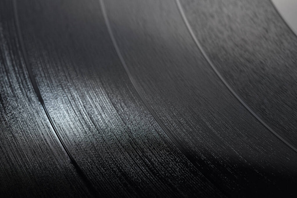 Close-up shot of 12-inch LP vinyl record groove. Macro photo. - Photo, Image