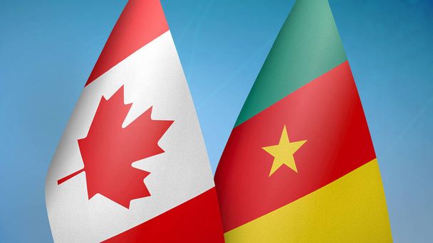 Canada e Camerun due bandiere insieme sfondo blu - Foto, immagini