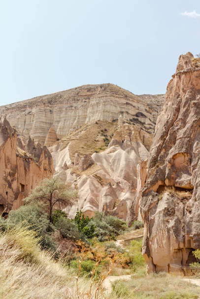 Goreme, Cappadocia, Turkey  23 August 2019: Rock monastery in Zelve. Zelve open air museum. Cappadocia Earth Pyramids. Tourism concept - 写真・画像
