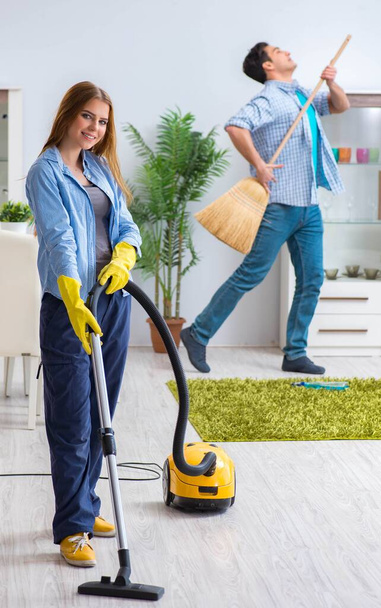 Young family cleaning the house - Photo, Image