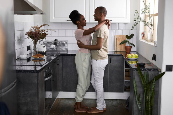 cute married couple dance in the kitchen - 写真・画像