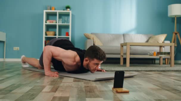 Young Man Practices Yoga - Video, Çekim
