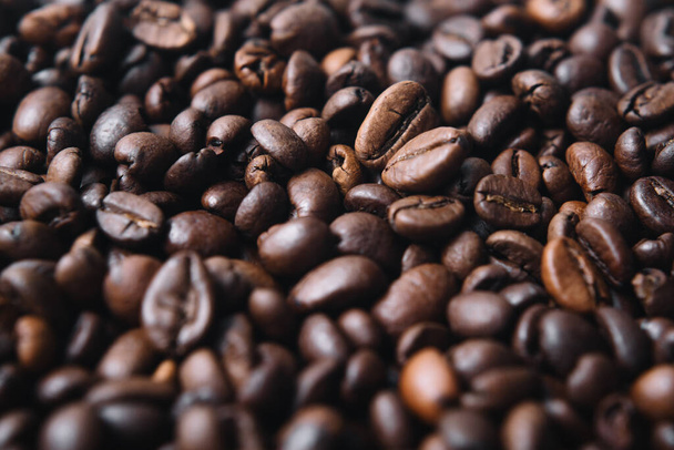 Roasted coffee beans background. - 写真・画像