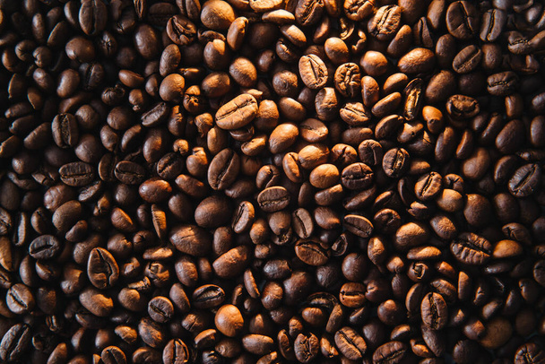 Roasted coffee beans background. - Фото, зображення