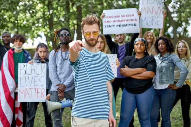 Black Lives Matters protesters holding signs outside - Fotó, kép