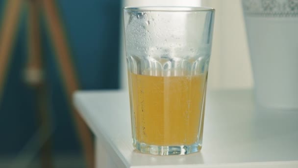 Glass of Vitamin Solution Taken by Man - Кадры, видео