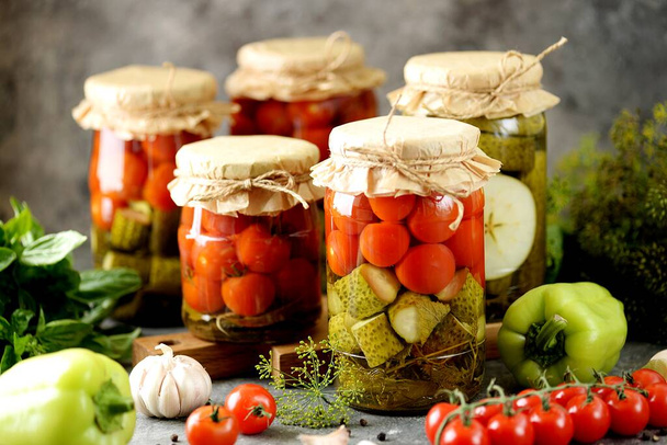 Homemade assorted vegetables - pickled cucumbers and cherry tomatoes. - Photo, Image