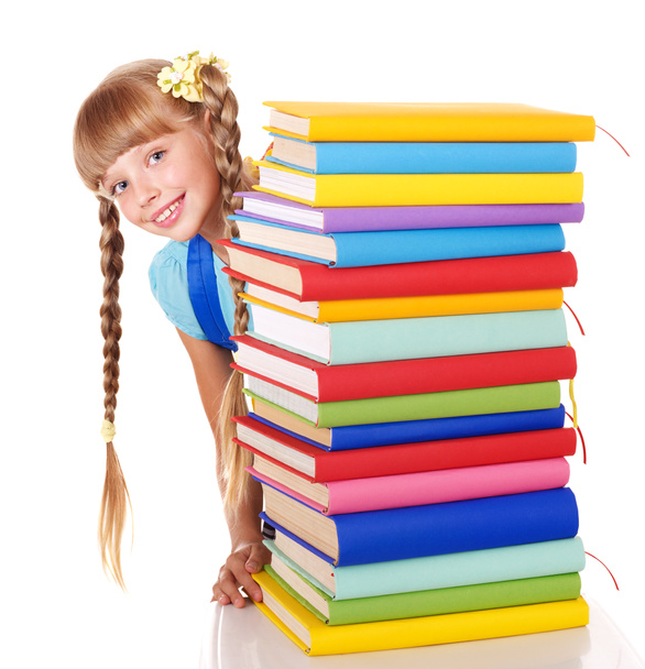 Schoolgirl with backpack holding pile of books. - Foto, Bild