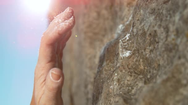 MACRO: Woman slips while trying to grab a crimp hold during a rock climbing trip - Footage, Video
