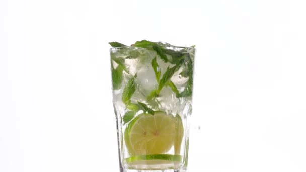 Ice Cubes Falling Into Mojito Cocktail - Footage, Video