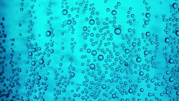 Las burbujas de agua azul Macro Video
 - Imágenes, Vídeo