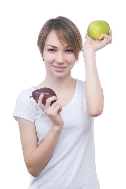 Pretty young girl with green apple - Фото, изображение