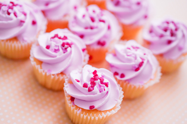 Cupcakes with pink cream and heart sprinkles - Foto, Imagem